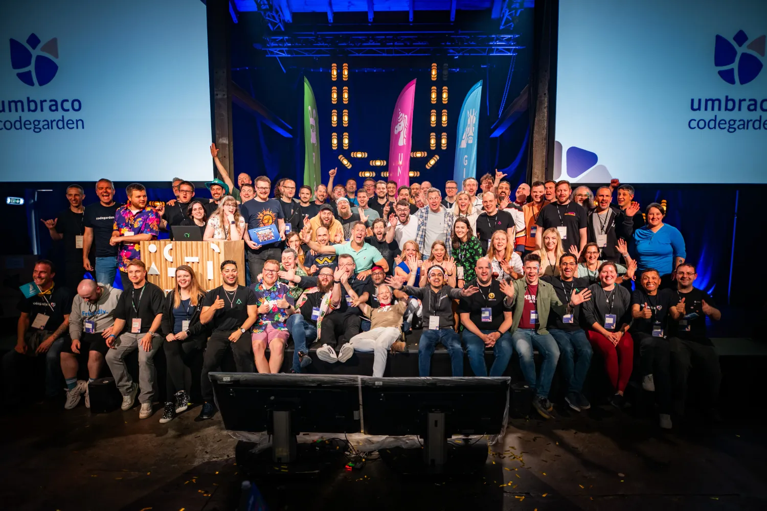 A group shot of all of the new and renewed MVPs who could attend Codegarden this year, smiling at the camera from the Codegarden stage