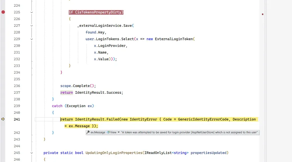 Error message reads `A token was attempted to be saved for login provider [AspNetUserStore] which is not assigned to this user`